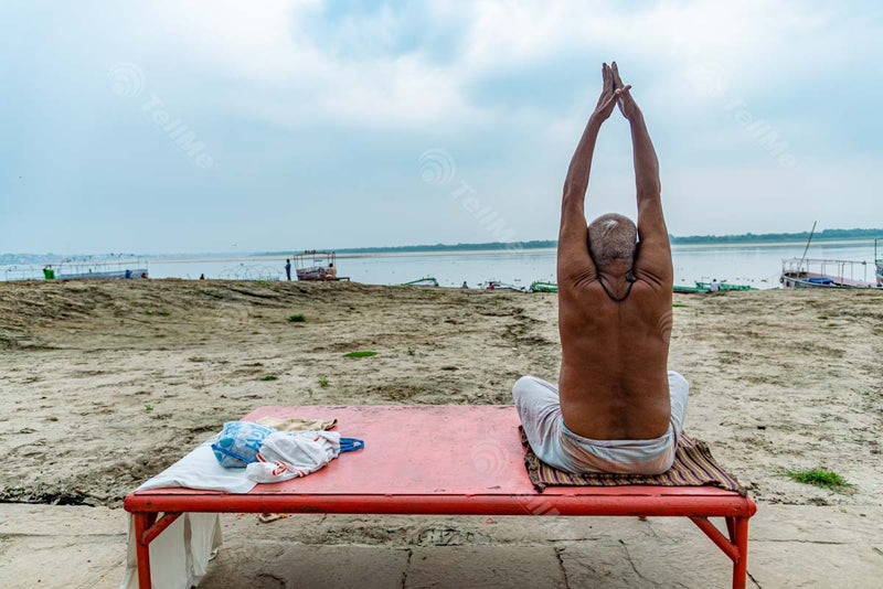 Aged Pilgrim's Yoga at Assi Ghat, Banaras, Uttar Pradesh
