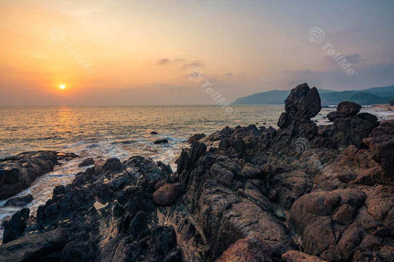 Discover the Hidden Gem of South Goa: Cola Beach - A Stunning Destination to Witness the Sunset from Rocky Cliffs