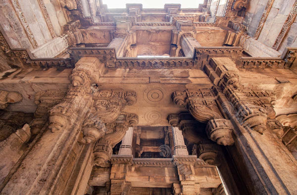 Lower Angle Marvelous capture of a historic site: Stunning Pillar Carvings of Dada Harir Ni Vav in Ahmedabad, Gujarat