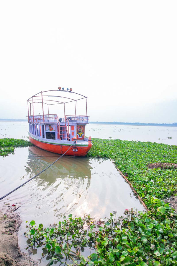 A Solitary Boat Docked on the Banks of Assi Ghat in Banaras, Uttar Pradesh
