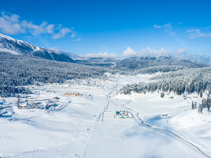 Aerial View of Snowy Trails, Resorts, and Majestic Peaks, Gulmarg in Kashmir, India