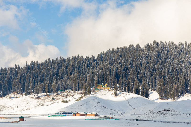 Snowy Panorama: Resorts amidst a Snow-Covered Landscape of Gulmarg in Kashmir, India
