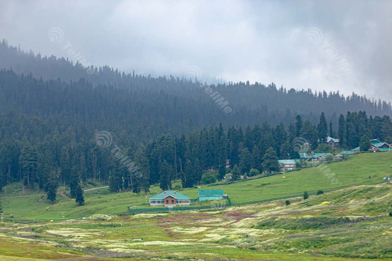 Scenic View of a Few Houses, Fields, and Beautiful Meadows with a Cloudy Sky in Gulmarg, Kashmir