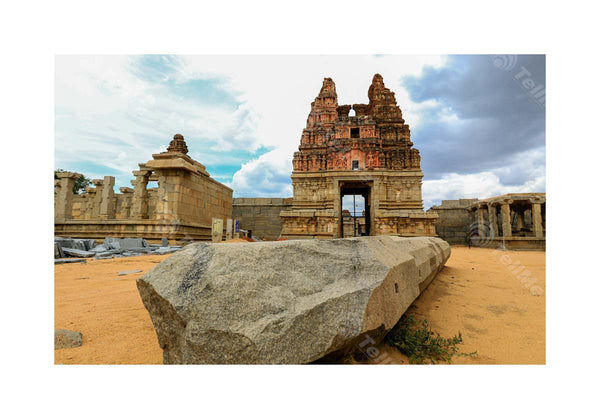 A fallen pillar amidst the ancient temple ruins of Hampi, Karnataka