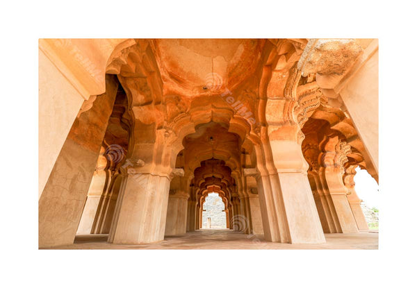 Beautiful carved stone arch. Lotus Mahal Temple in Hampi, Karnataka