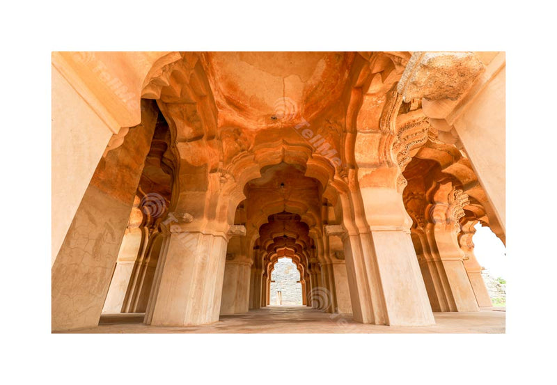 Beautiful carved stone arch. Lotus Mahal Temple in Hampi, Karnataka