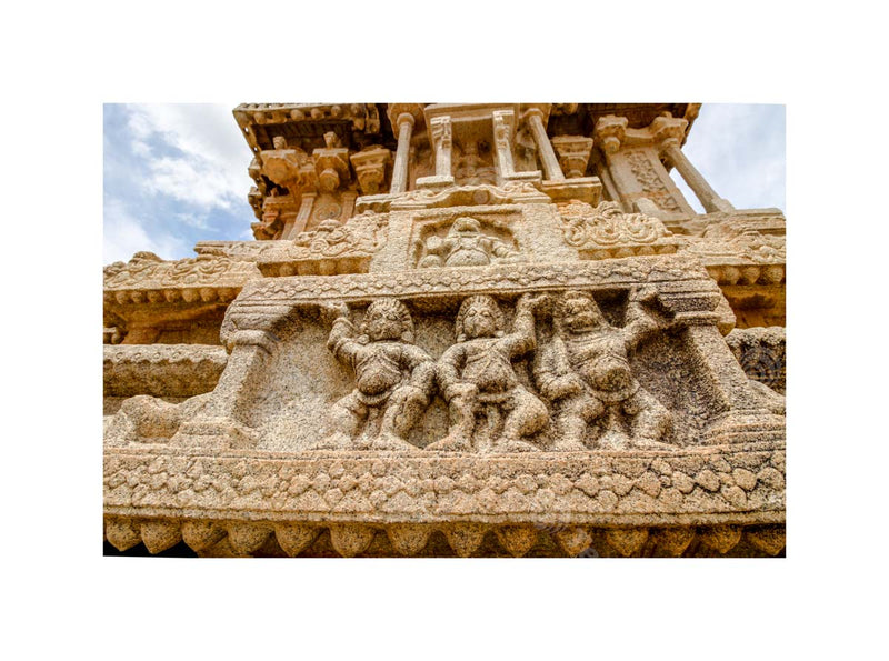 Divine Artistry: Vijaya Vitthala Temple's Stone Chariot Sculpted Lord Narasimha and Dancers in Hampi, Karnataka