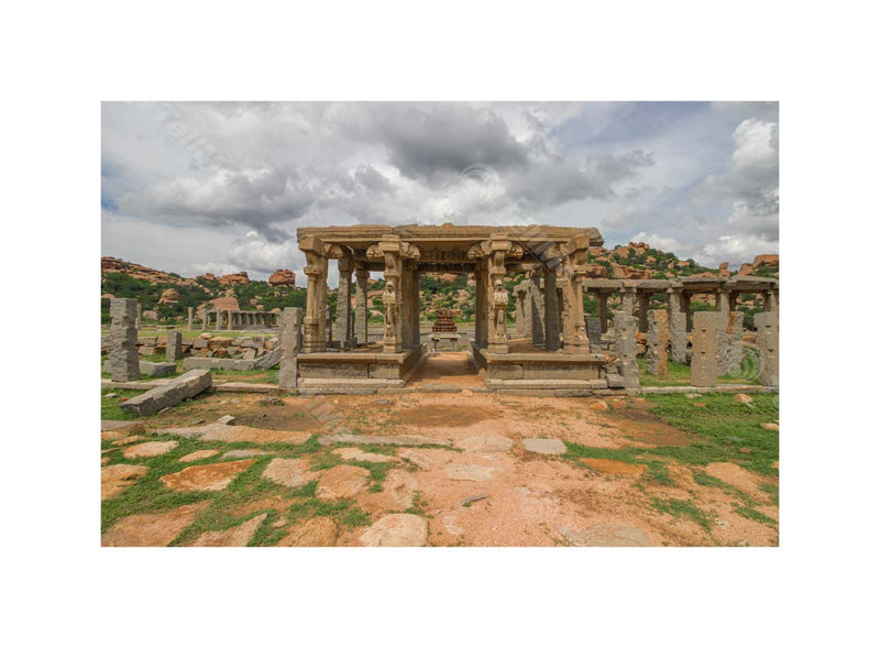 Ruins of Vijayanagar: Ancient Temple Pillars in Hampi, Karnataka - A City of Gods, Temples, and Ruins