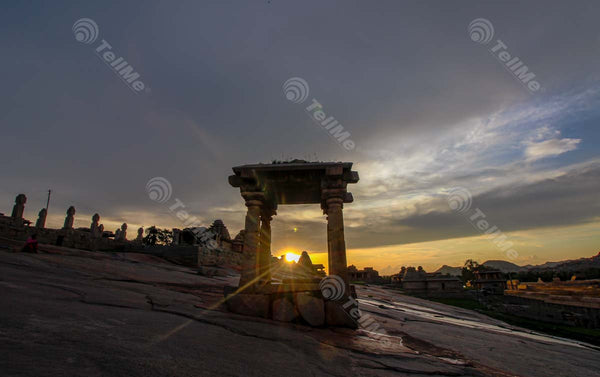 sunset view of the ruined temple at the Hemkuta hill of Hampi in Karnataka