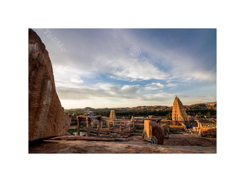 Golden Horizon: Sunset View of Hampi's Enchanting Ruins and Temples in Karnataka