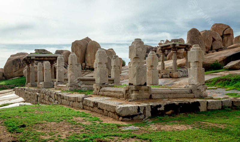 Enchanting Abandoned Temple Ruins: Hemkuta Hill's Greenery and Majestic Rocks in Hampi, Karnataka