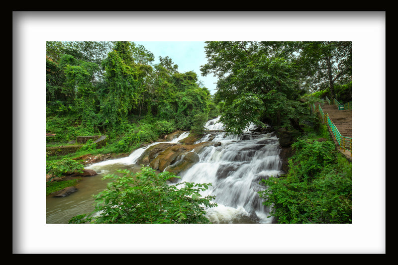 Waterfall floating water over the rocks Aruvikzhy Waterfalls Kottayam Kerala