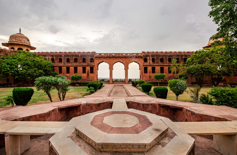 Charbagh: Persian-Inspired Quadrilateral beautiful garden under a cloudy sky in Jaigarh Fort, Rajasthan.