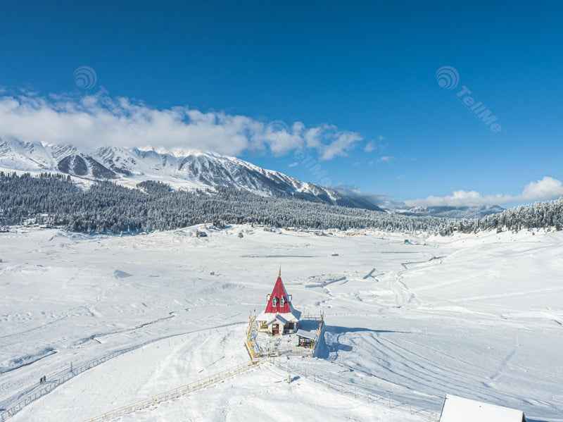 Drone View of Sunny Snowy Scene around Mohinishwar Temple in Gulmarg, Kashmir, India