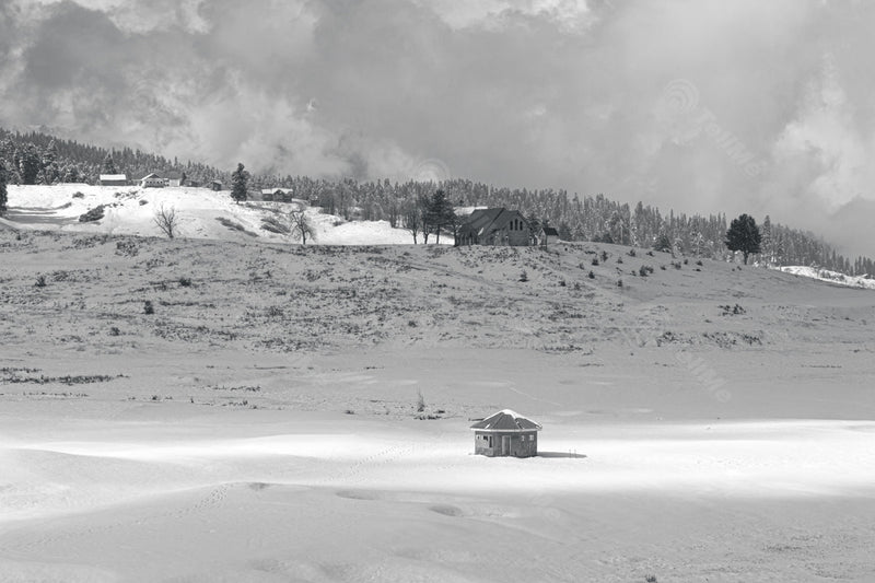 Snowy Pasture with Hut and St Mary's Church in Cloudy Weather of Gulmarg in Kashmir, India