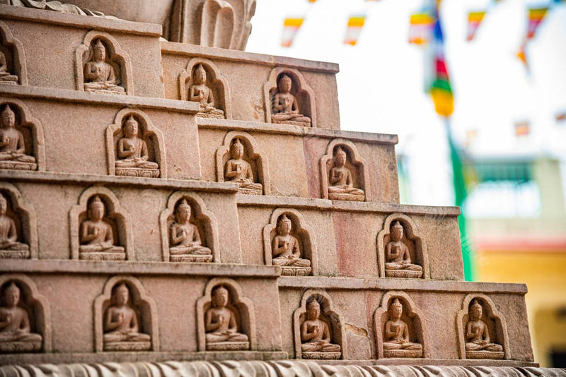 Breathtaking Stone Carvings: Lord Buddha Idols at Sarnath Tibetan Temple