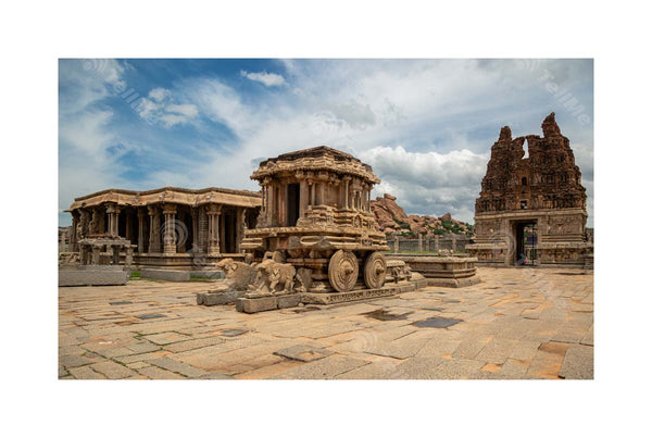 Hampi's Vijaya Vittala Temple: Stone Chariot and Cloudy Skies